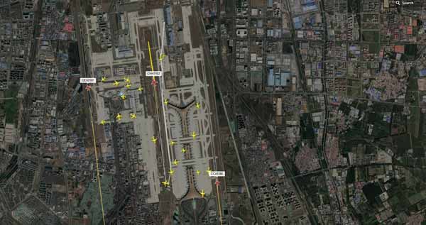 Pesawat 
mendarat bersamaan di Beijing International Airport